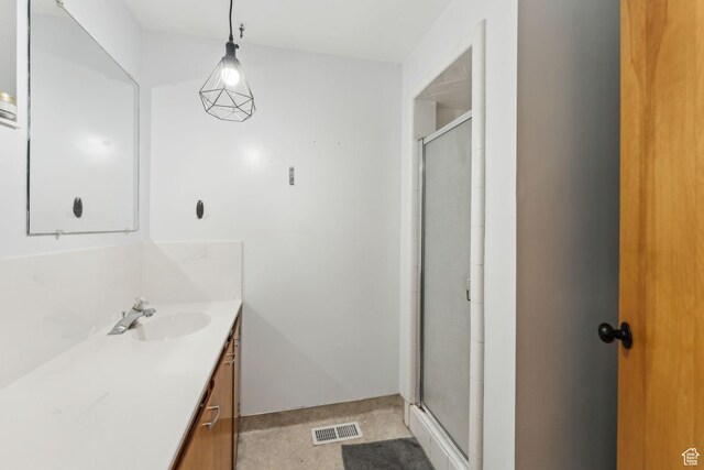 374 S Fairlane, Tooele, UT 84074 - bathroom featuring a shower stall, vanity, and visible vents