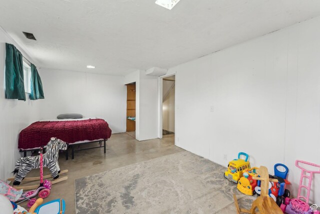 374 S Fairlane, Tooele, UT 84074 - bedroom with concrete flooring