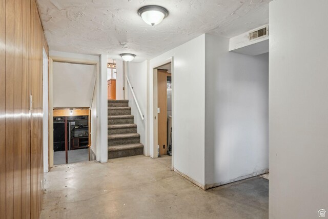 374 S Fairlane, Tooele, UT 84074 - below grade area with visible vents, wood walls, and stairs