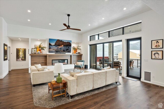 655 Wilard Peak Rd, Mantua, UT 84324 - living area featuring recessed lighting, dark wood finished floors, baseboards, and ceiling fan