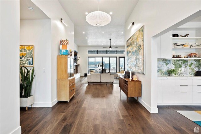 655 Wilard Peak Rd, Mantua, UT 84324 - corridor with baseboards, recessed lighting, and dark wood-style flooring