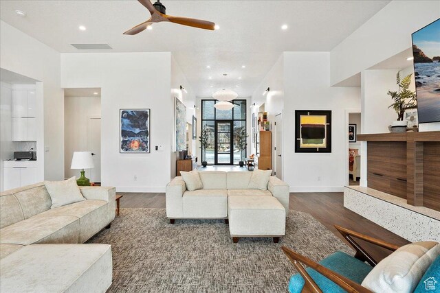 655 Wilard Peak Rd, Mantua, UT 84324 - living room featuring ceiling fan, baseboards, wood finished floors, and recessed lighting