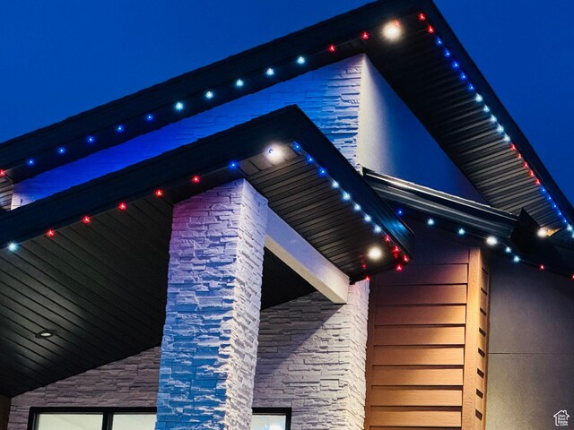655 Wilard Peak Rd, Mantua, UT 84324 - property exterior at twilight with stone siding