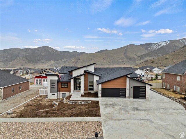 655 Wilard Peak Rd, Mantua, UT 84324 - view of front of property featuring a residential view, a mountain view, and concrete driveway