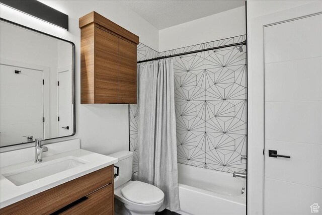 655 Wilard Peak Rd, Mantua, UT 84324 - full bathroom with shower / tub combo with curtain, toilet, and vanity