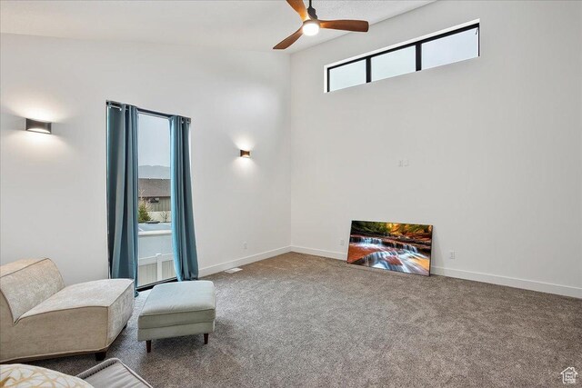 655 Wilard Peak Rd, Mantua, UT 84324 - living area featuring carpet floors, a ceiling fan, and baseboards