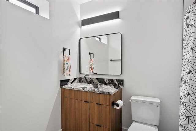 655 Wilard Peak Rd, Mantua, UT 84324 - full bathroom featuring toilet and vanity