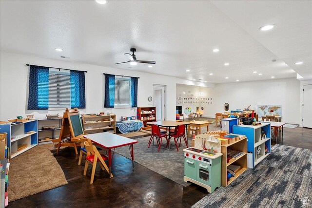 655 Wilard Peak Rd, Mantua, UT 84324 - rec room featuring concrete flooring, a ceiling fan, and recessed lighting