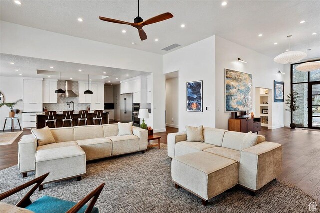 655 Wilard Peak Rd, Mantua, UT 84324 - living area with ceiling fan, dark wood-style flooring, visible vents, and recessed lighting