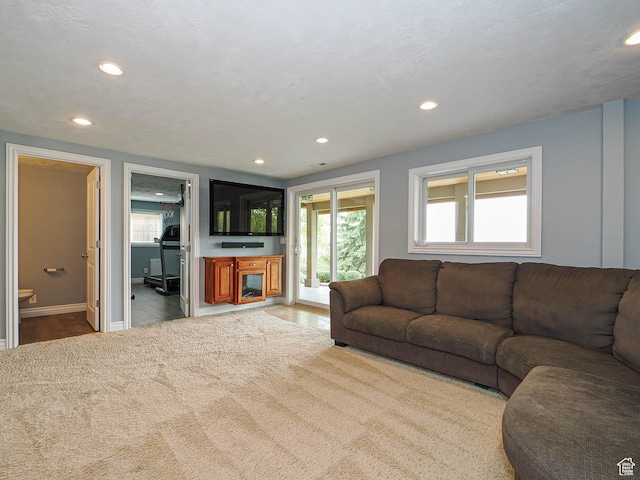 1022 E Northbonneville Dr N, Salt Lake City, UT 84103 - carpeted living room with recessed lighting and baseboards