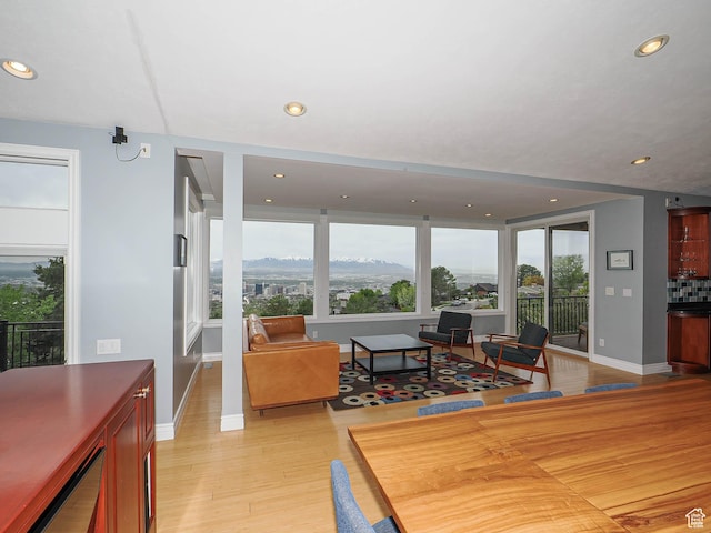 1022 E Northbonneville Dr N, Salt Lake City, UT 84103 - living area with recessed lighting, light wood-style flooring, and baseboards