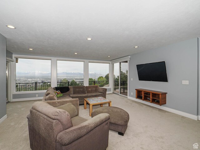 1022 E Northbonneville Dr N, Salt Lake City, UT 84103 - living area featuring light carpet, baseboards, and recessed lighting