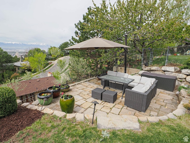 1022 E Northbonneville Dr N, Salt Lake City, UT 84103 - view of patio featuring an outdoor hangout area and fence