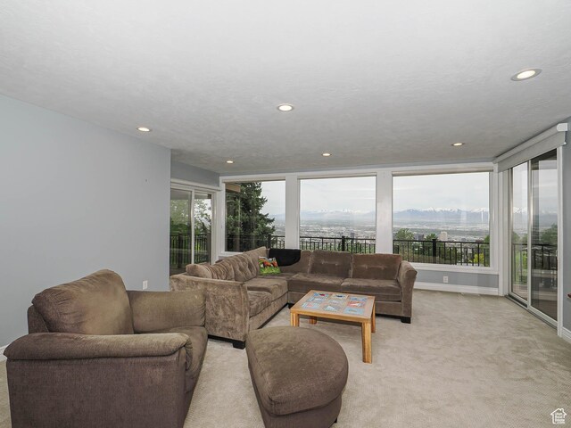 1022 E Northbonneville Dr N, Salt Lake City, UT 84103 - living room with recessed lighting and light colored carpet