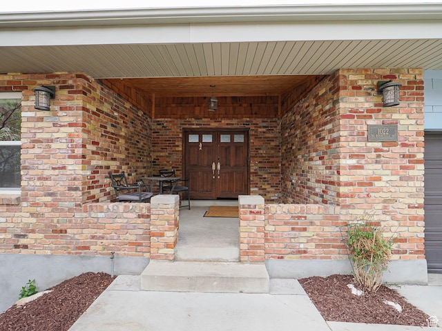 1022 E Northbonneville Dr N, Salt Lake City, UT 84103 - property entrance with covered porch and brick siding