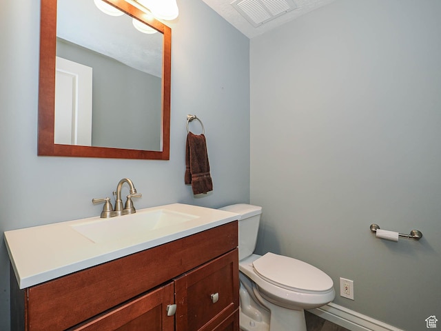 1022 E Northbonneville Dr N, Salt Lake City, UT 84103 - bathroom with vanity, toilet, and baseboards