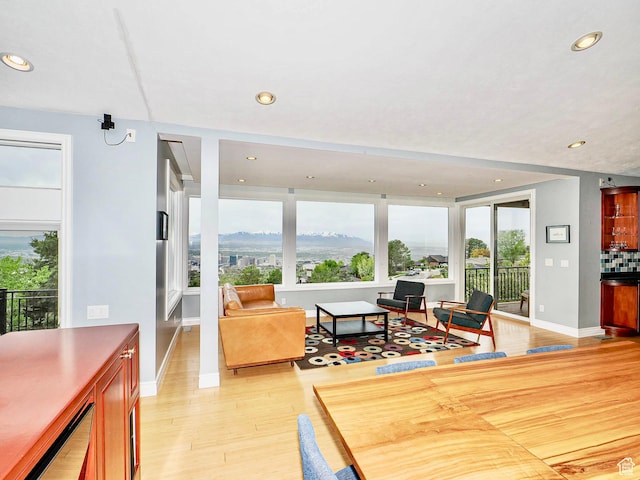1022 E Northbonneville Dr N, Salt Lake City, UT 84103 - living room with recessed lighting, light wood-style flooring, and baseboards