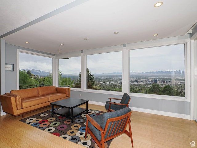 1022 E Northbonneville Dr N, Salt Lake City, UT 84103 - living room featuring wood finished floors, a mountain view, recessed lighting, and baseboards
