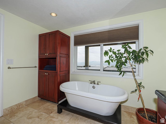 1022 E Northbonneville Dr N, Salt Lake City, UT 84103 - bathroom featuring a freestanding tub and recessed lighting