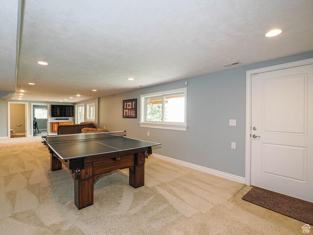 1022 E Northbonneville Dr N, Salt Lake City, UT 84103 - recreation room featuring recessed lighting, light carpet, and baseboards