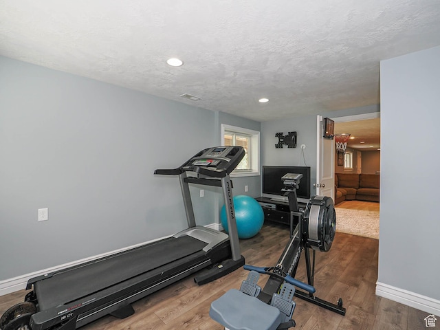 1022 E Northbonneville Dr N, Salt Lake City, UT 84103 - workout area with baseboards, wood finished floors, recessed lighting, and a textured ceiling