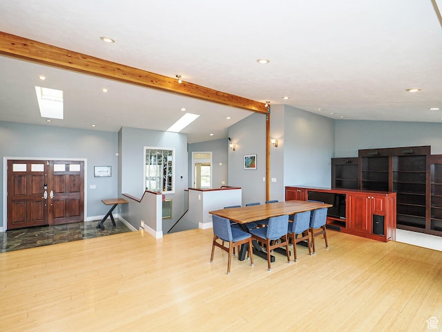 1022 E Northbonneville Dr N, Salt Lake City, UT 84103 - dining room featuring wood finished floors, recessed lighting, a skylight, and baseboards