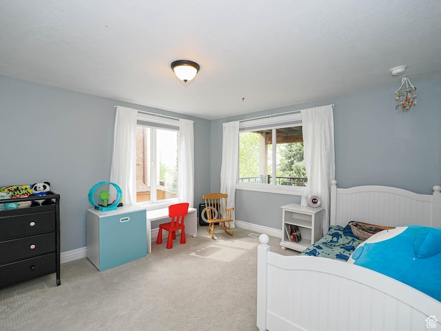 1022 E Northbonneville Dr N, Salt Lake City, UT 84103 - carpeted bedroom featuring baseboards