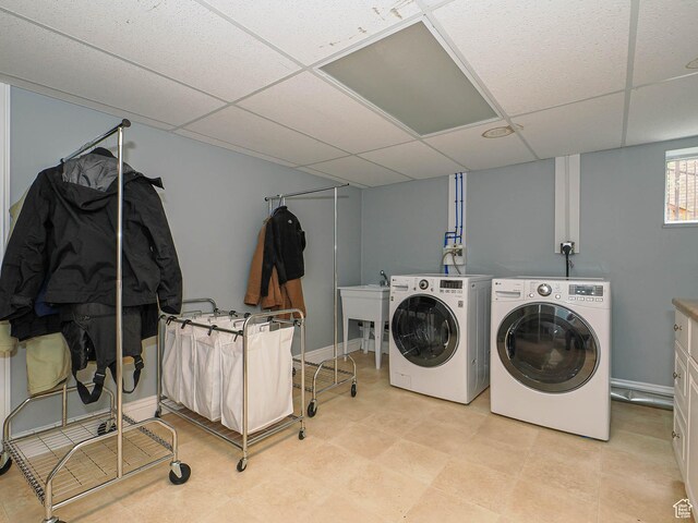 1022 E Northbonneville Dr N, Salt Lake City, UT 84103 - clothes washing area featuring independent washer and dryer and a sink