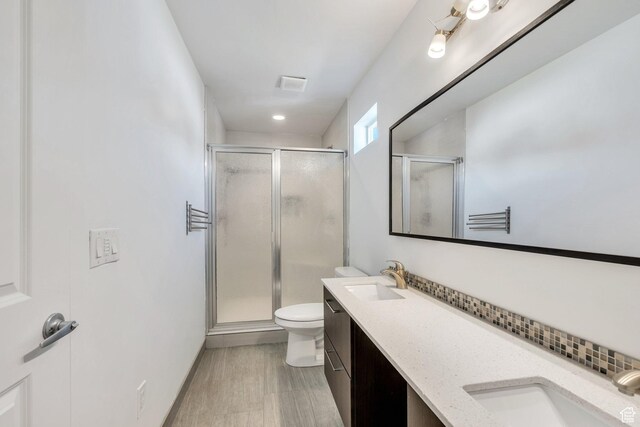 1001 S 400 E, Orem, UT 84097 - full bathroom with a sink, a shower stall, double vanity, and toilet