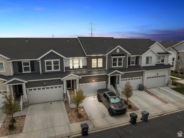 269 W 590 N, Vineyard, UT 84059 - view of property with a garage, board and batten siding, and concrete driveway