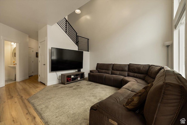 269 W 590 N, Vineyard, UT 84059 - living room featuring baseboards and light wood-type flooring