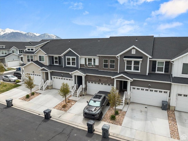 269 W 590 N, Vineyard, UT 84059 - multi unit property featuring a residential view, a mountain view, concrete driveway, an attached garage, and board and batten siding