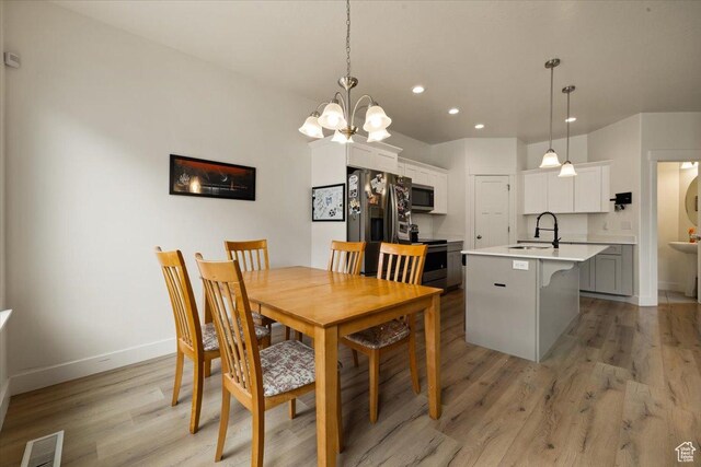 269 W 590 N, Vineyard, UT 84059 - dining room with baseboards, an inviting chandelier, visible vents, recessed lighting, and light wood-style floors