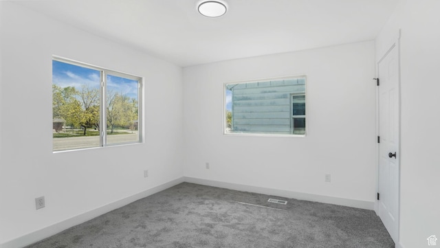 557 N 1200 W, Salt Lake City, UT 84116 - spare room with carpet floors, visible vents, and baseboards