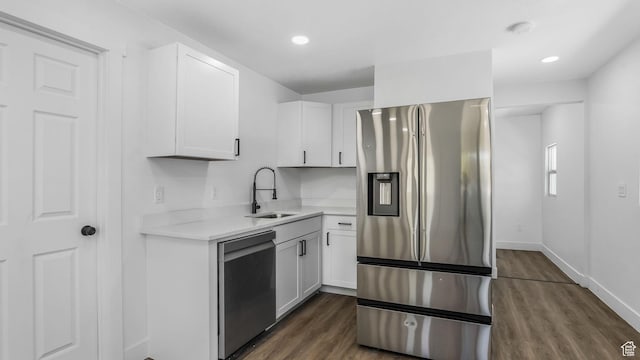 557 N 1200 W, Salt Lake City, UT 84116 - kitchen with light countertops, a sink, white cabinetry, and appliances with stainless steel finishes