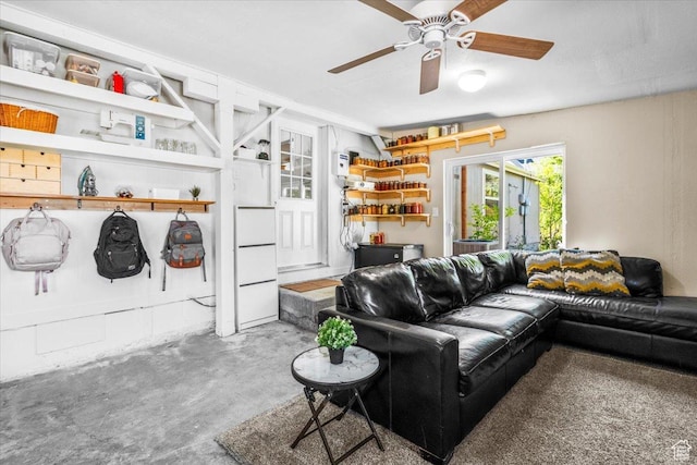 540 S 100 W, Manti, UT 84642 - living room with a ceiling fan and unfinished concrete floors