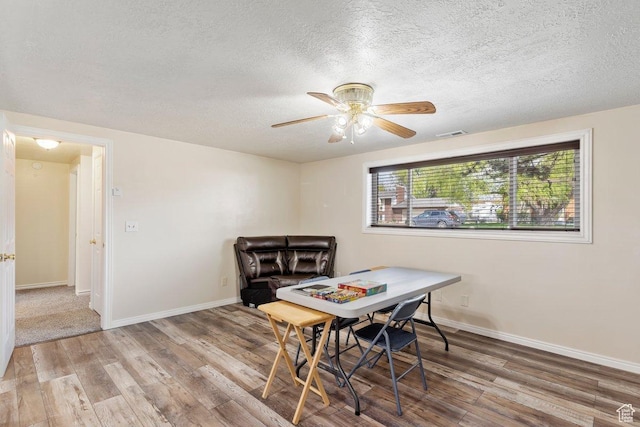 1971 N 3060 W, Clinton, UT 84015 - dining area with a ceiling fan, wood finished floors, a textured ceiling, and visible vents