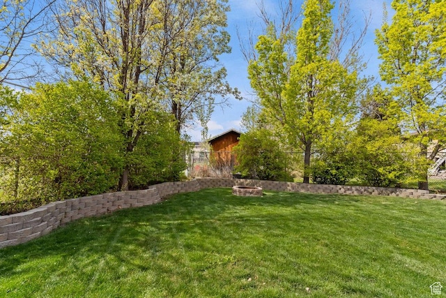 1971 N 3060 W, Clinton, UT 84015 - view of yard featuring fence and a fire pit