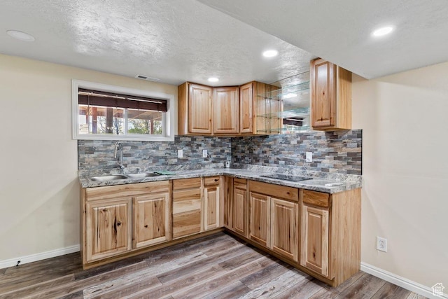 1971 N 3060 W, Clinton, UT 84015 - kitchen featuring baseboards, black electric cooktop, visible vents, and a sink