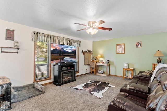 1971 N 3060 W, Clinton, UT 84015 - living area featuring carpet, baseboards, a fireplace, a textured ceiling, and ceiling fan