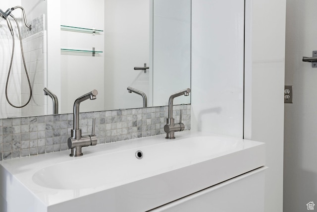 521 E 5th Ave Unit 302, Salt Lake City, UT 84103 - bathroom featuring tasteful backsplash and vanity