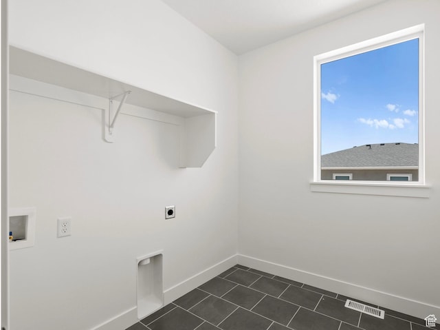 1256 W 800 S # 12, Spanish Fork, UT 84660 - washroom with washer hookup, electric dryer hookup, and dark tile patterned flooring