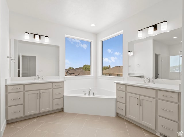 1256 W 800 S # 12, Spanish Fork, UT 84660 - bathroom featuring a garden tub, two vanities, tile patterned floors, and recessed lighting