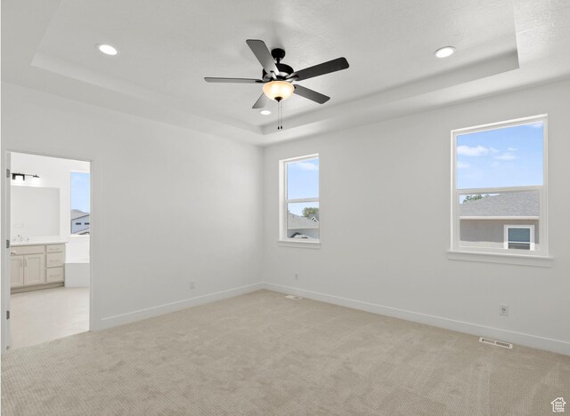 1256 W 800 S # 12, Spanish Fork, UT 84660 - empty room with a raised ceiling, ceiling fan, recessed lighting, and light colored carpet