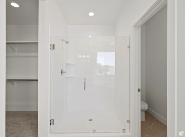 1256 W 800 S # 12, Spanish Fork, UT 84660 - bathroom with a stall shower, a spacious closet, tile patterned flooring, and recessed lighting
