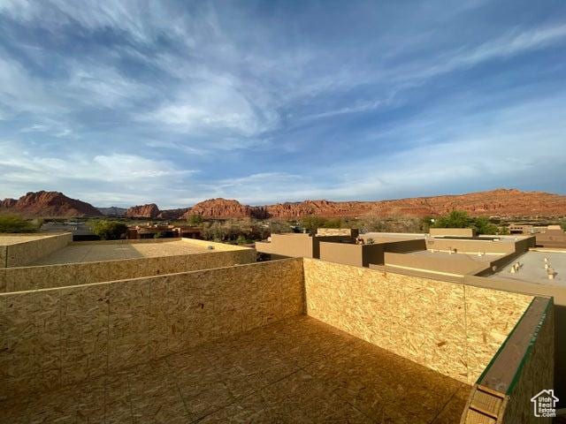 1500 E Split Rock Dr Unit 65, Ivins, UT 84738 - view of yard featuring a balcony and a mountain view