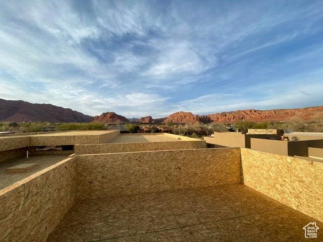 1500 E Split Rock Dr Unit 65, Ivins, UT 84738 - view of yard featuring a balcony and a mountain view