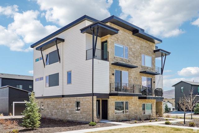 1152 Gambel Oak Way, Park City, UT 84098 - view of home's exterior with stone siding and a balcony