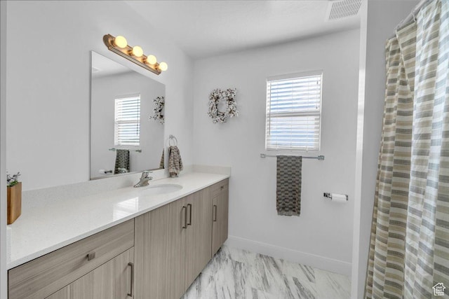 1519 E Honeycomb Dr S, St George, UT 84790 - full bath featuring vanity, baseboards, a shower with shower curtain, and marble look tile flooring