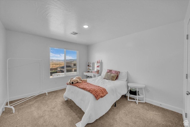 1519 E Honeycomb Dr S, St George, UT 84790 - bedroom featuring carpet flooring, baseboards, and a textured ceiling